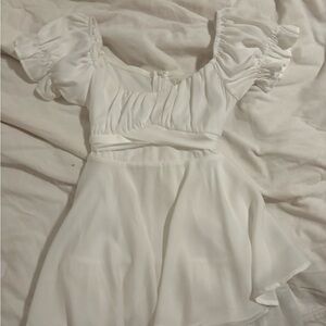 Francesca’s white flowy romper